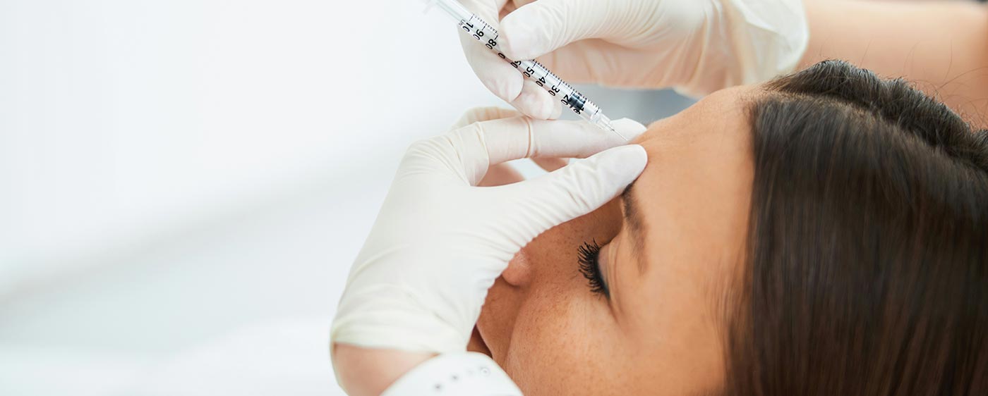 Anti‑wrinkle injections being administered near the eyes at our Birmingham clinic